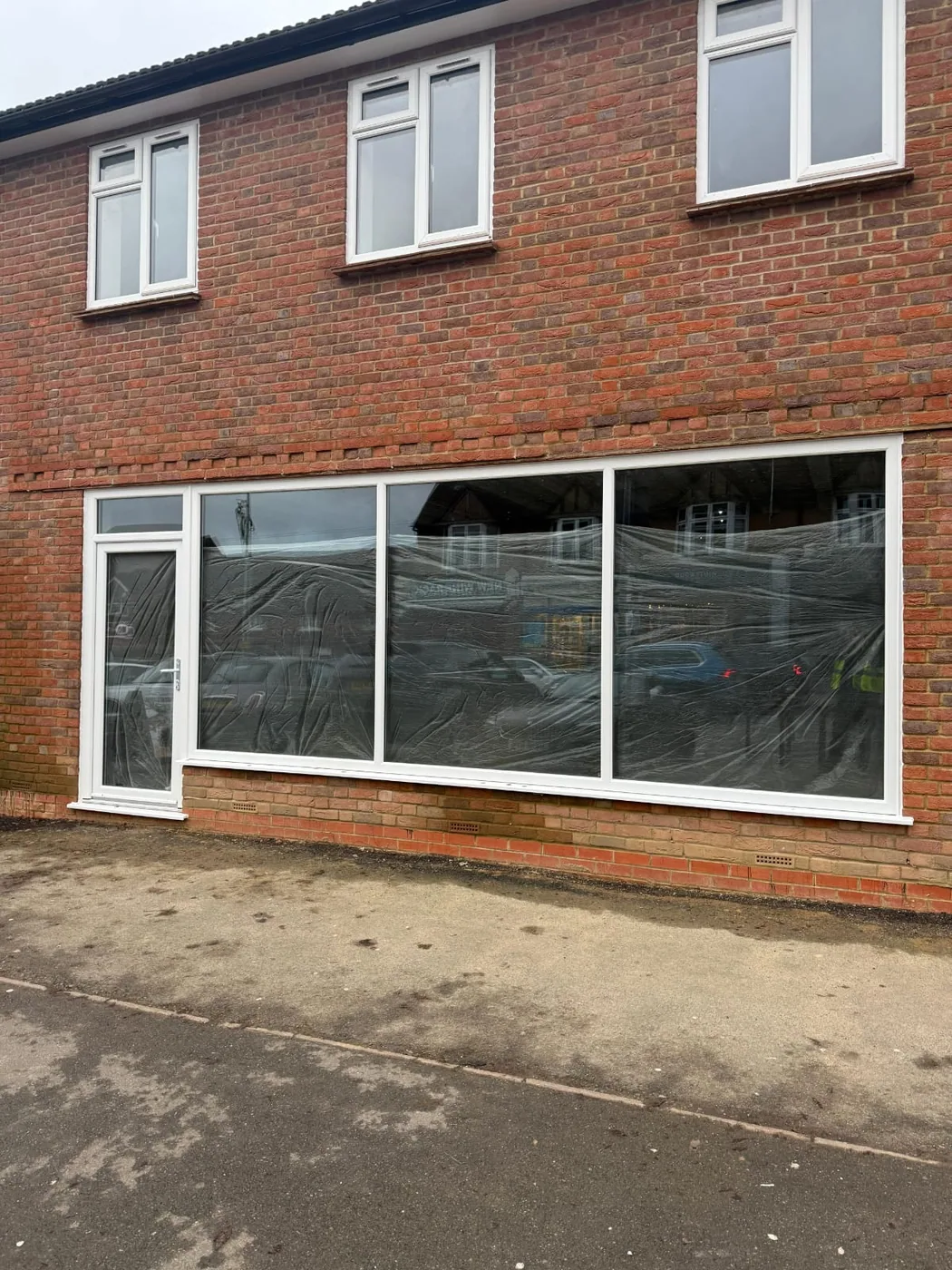 Completed commercial shopfront installation by Shopfront Shutters