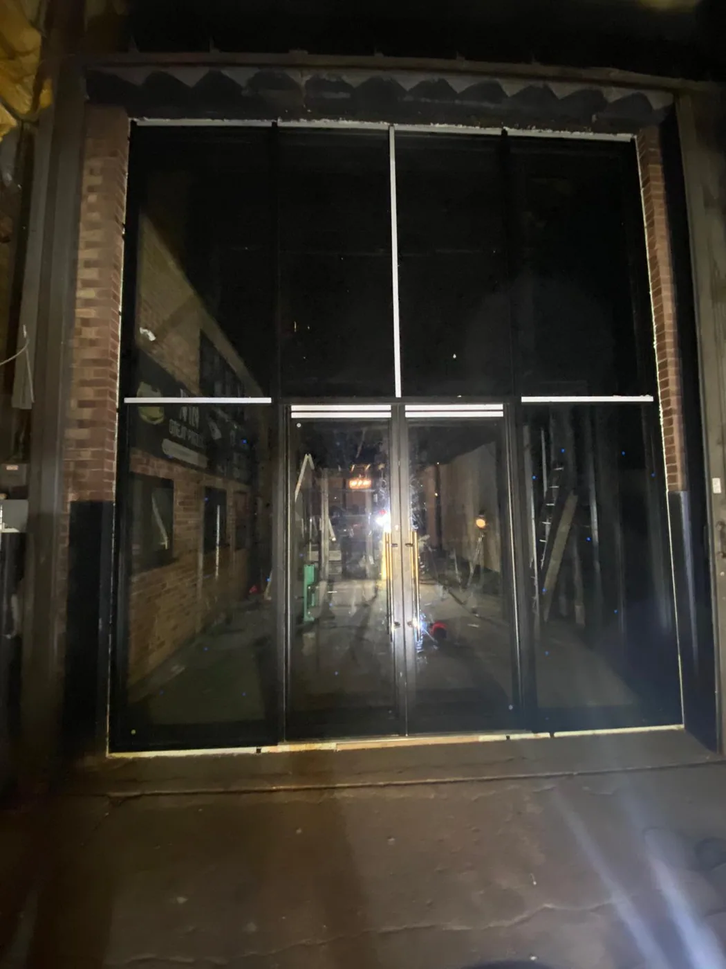 Completed commercial shopfront installation by Shopfront Shutters